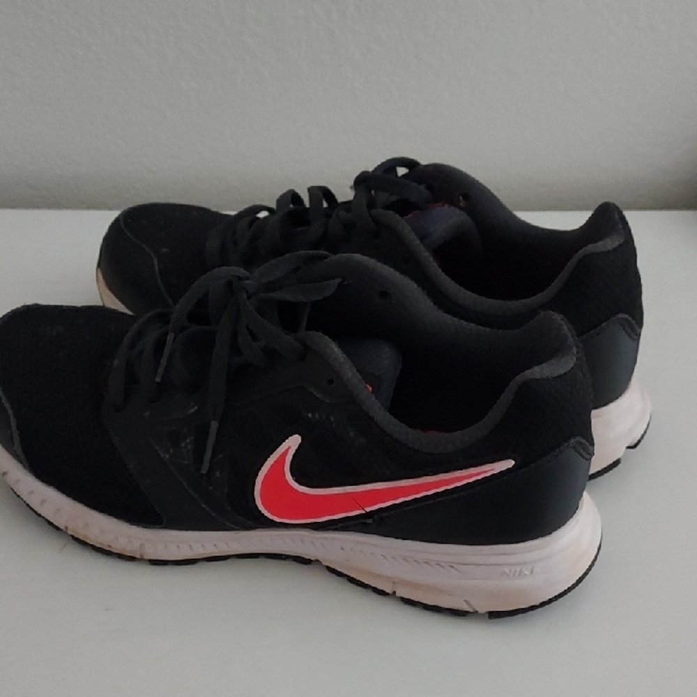 Nike Black Sneakers with Red Swoosh
